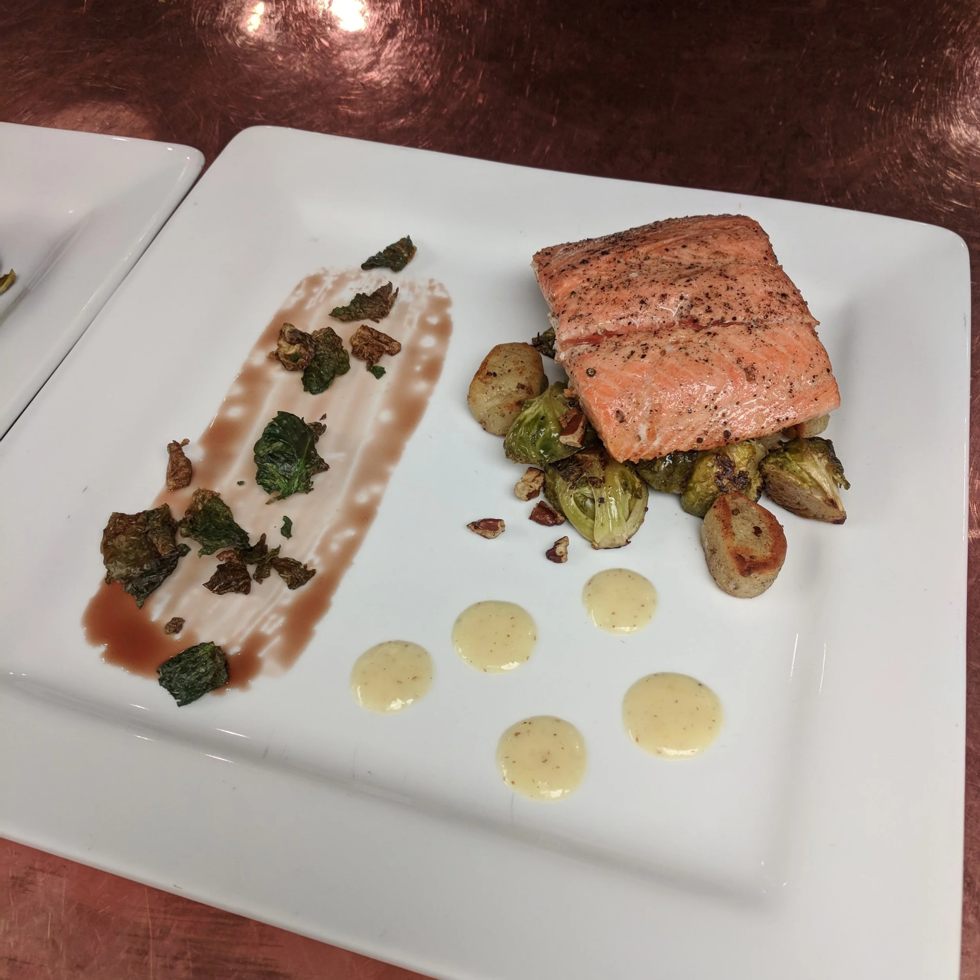 Seared salmon with brussels sprouts, fingerling potatoes and mustard cream